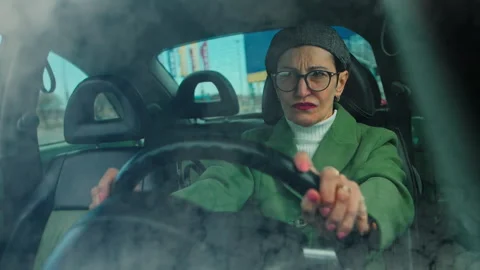Confident Elderly Woman Preparing to Drive Her Car Stock Footage 303720193