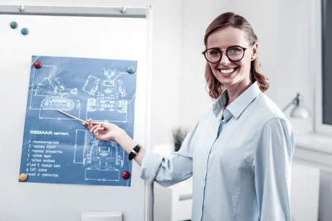 Confident engineer presenting her project Stock Photos