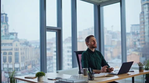 Confident executive thinking success sitting at corporate workplace laptop. Stock Footage 340305398
