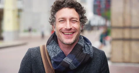 Confident, face and man in city with smile for career development or travel to Stock Footage 334521178