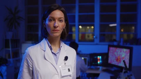 Confident female scientist posing in lab Stock Footage 124715880