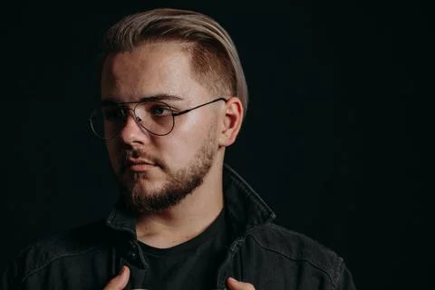 Confident guy with a serious look. Stock Photos