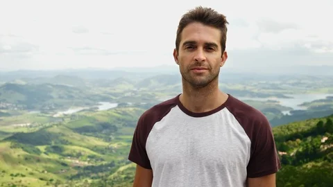 Confident guy smiling 스톡 동영상 93264635