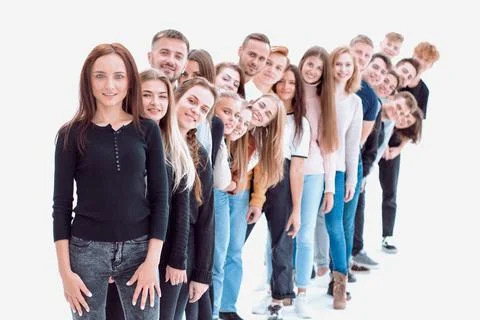 Confident guy standing first in the column of young people Stock Photos