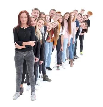 Confident guy standing first in the column of young people Stock Photos