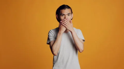 Confident hipster guy doing three wise monkeys sign Video stock 233541391