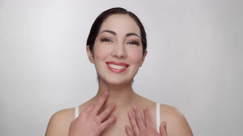 Confident hispanic model admires herself in camera, caressing hair and skin Stock Footage 193664433