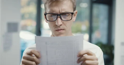 Confident man breaking a contract Stock Footage 168366761