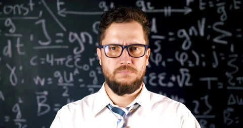 Confident man looking at a camera and smiling 스톡 동영상 131553836