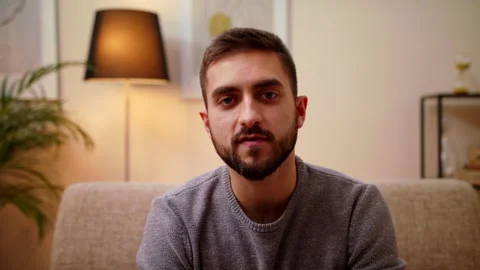 Confident Man Looking At Camera In Home Office, Distant Call Job Interview Stock Footage 147002624