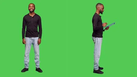 Confident man posing on camera and taking notes Stock Photos