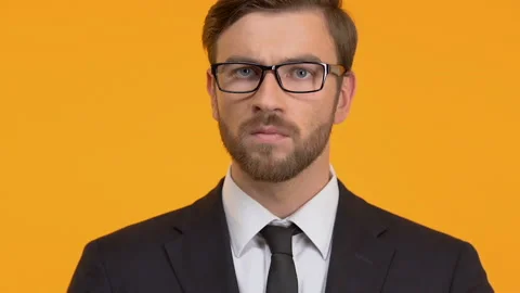 Confident man showing stop gesture, refusal of bribes, honest business, close-up Stock Footage 104704381