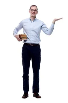 Confident man with a stack of books pointing at you. Stock Photos