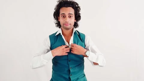 Confident man in a vest talking having conversation posing with a hand gest.. Stock Footage 262936699