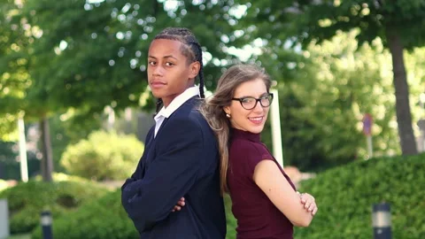 Confident multiethnic business partners posing back to back Stock Footage 317014376