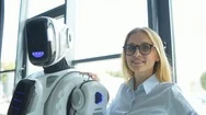 Confident Office Worker Touching Shoulder Of Robot And Smiling Stock Footage