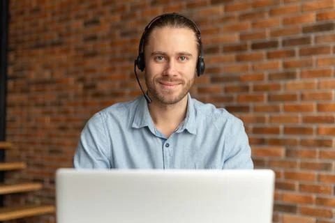 Confident operator working at the laptop Stock Photos