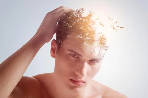 Confident phlegmatic guy in process of creation Foto stock