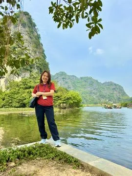 Confident pose before mountains. Stock Photos