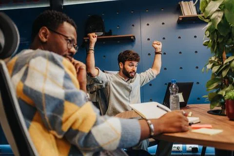 Confident professionals collaborate, gather data, and solve problems in a Stock Photos