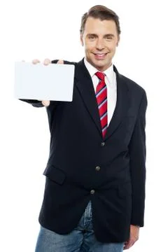 Confident sales representative presenting blank placard Fotos Stock