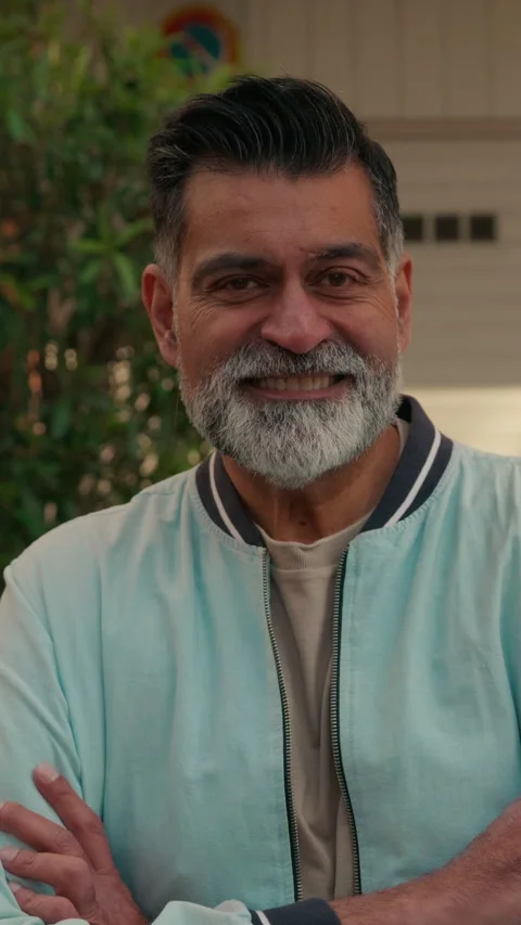 Confident Smiling Man with Gray Beard Looking at Camera Stock Footage 328101582
