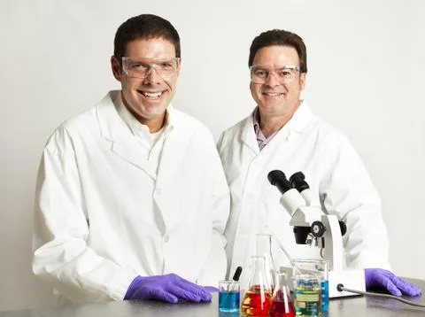Confident Smiling Scientists Stock Photos