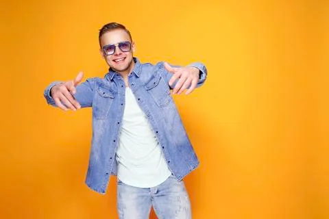 Confident stylish guy pointing at camera Stock Photos
