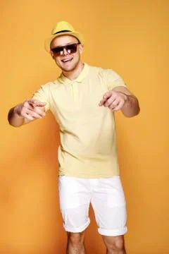 Confident stylish guy pointing at camera Stock Photos