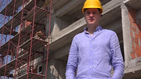 Confident successful house builder showing thumbs up real estate engineer site Stock Footage