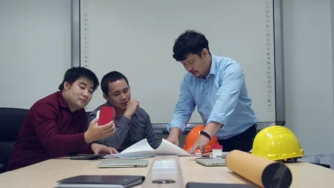 Confident team of architect working together in a office. Stock Footage 147176376
