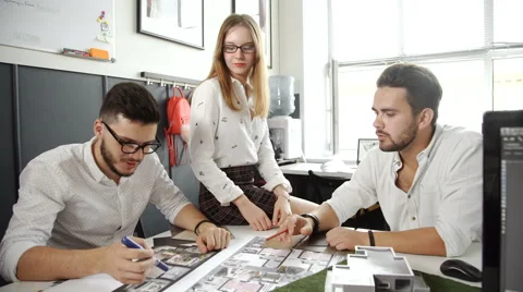 Confident team of engineers working together in a architect studio 20s. 4k Stock Footage 68203671