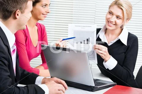 Confident woman is demonstrating the financial plan of company development to bu Stock Photos