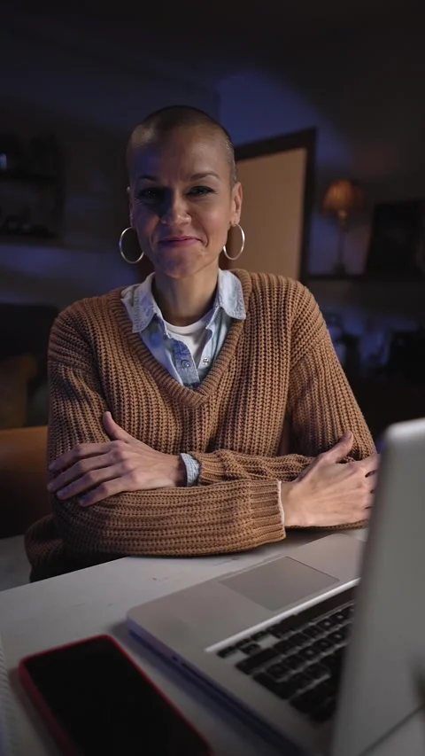 Confident woman using laptop to work from home, looking at camera smiling. Stock Footage 253642817