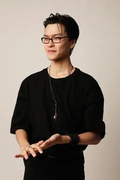 Confident young asian man posing on the white background. Mental health issues. 스톡 사진