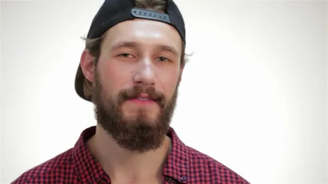 Confident young bearded man posing stylishly for the camera Stock Footage 311235316