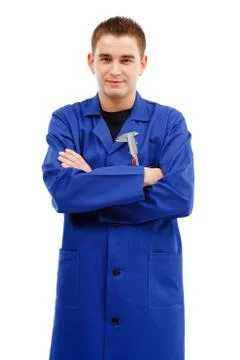 Confident young engineer with folded arms Stock Photos