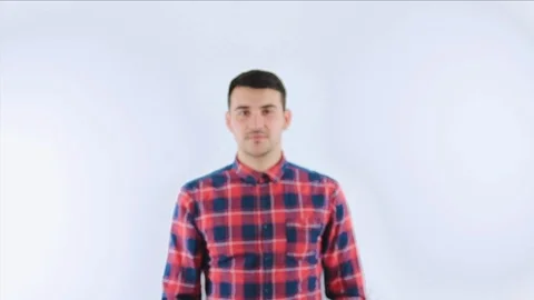 Confident young guy walking to camera Stock Footage 105925816