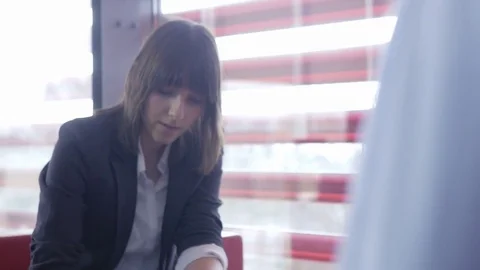 Confident young professionals considering business ideas Stock Footage