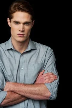 Confident young smart guy Stock Photos
