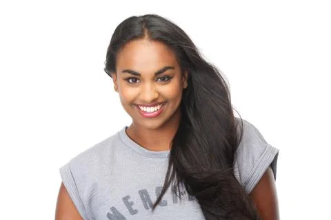 Confident young woman smiling on isolated white background Stock Photos