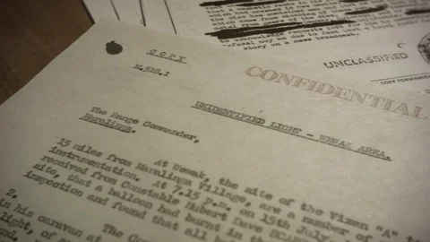 CONFIDENTIAL DOCUMENTS DOLLY Video stock 90062748