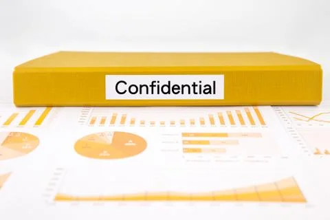 Confidential documents, graph analysis and undisclosed reports Stock Photos