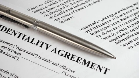Confidentiality agreement document close up Stock Footage 90557462