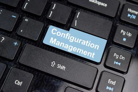 Configuration Management write on keyboard isolated on laptop background Stock Photos