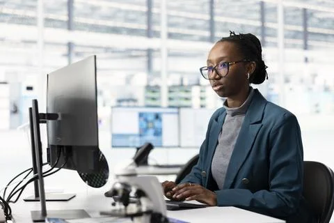 Configuring PCB electronic hardware setups, computer and woman Stock Photos