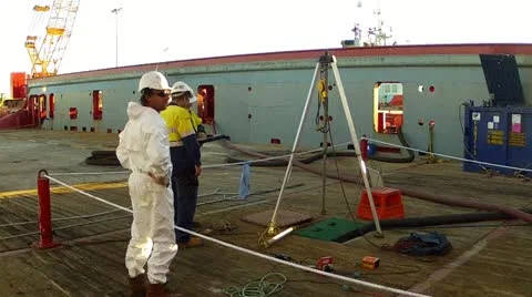 Confined space signing the permit before entry.MP4 Stock Footage 11968389
