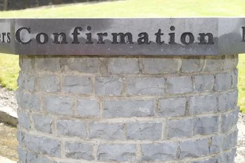 Confirmation inscribed on a granite table Stock Photos