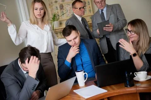 Conflict on business meeting with team at office Stock Photos