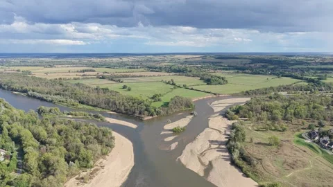 The confluence of the Loire and Allier rivers at Bec dAllier, France. The video Stock Footage 346719379